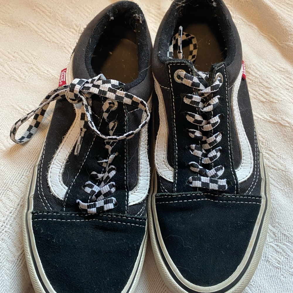 Vans black with checkerboard accents